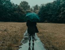 Woman out in the rain