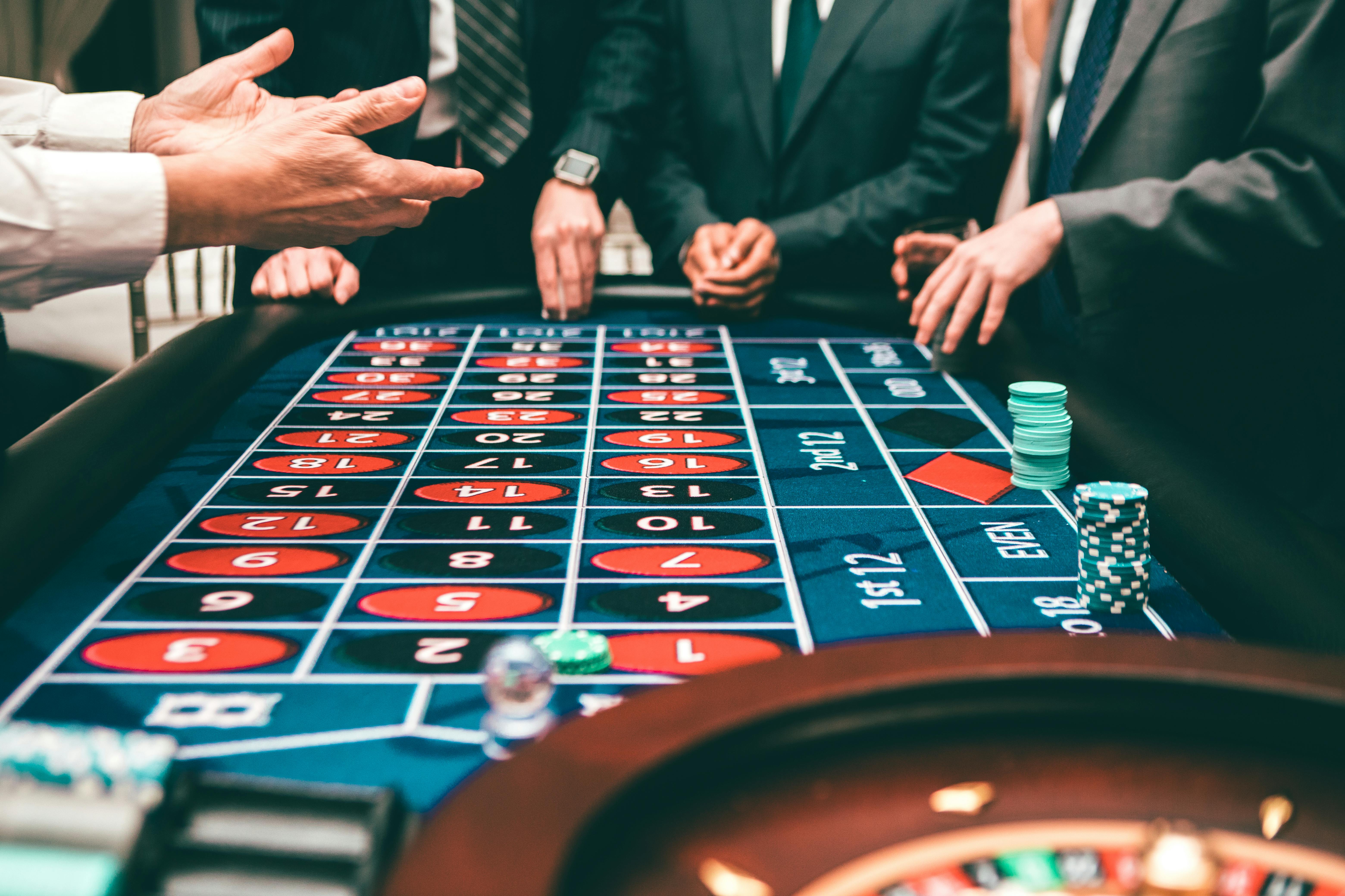 poker table with people around it